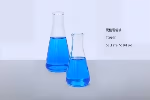 Mix 4–10% copper sulfate crystals (by weight) with distilled or deionized water